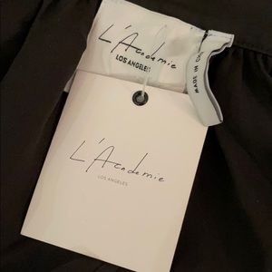 Float open back black top